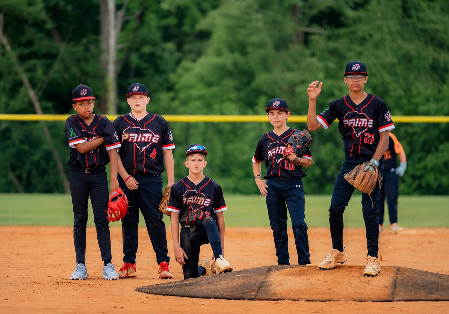 5G Prime baseball team meeting on the mound